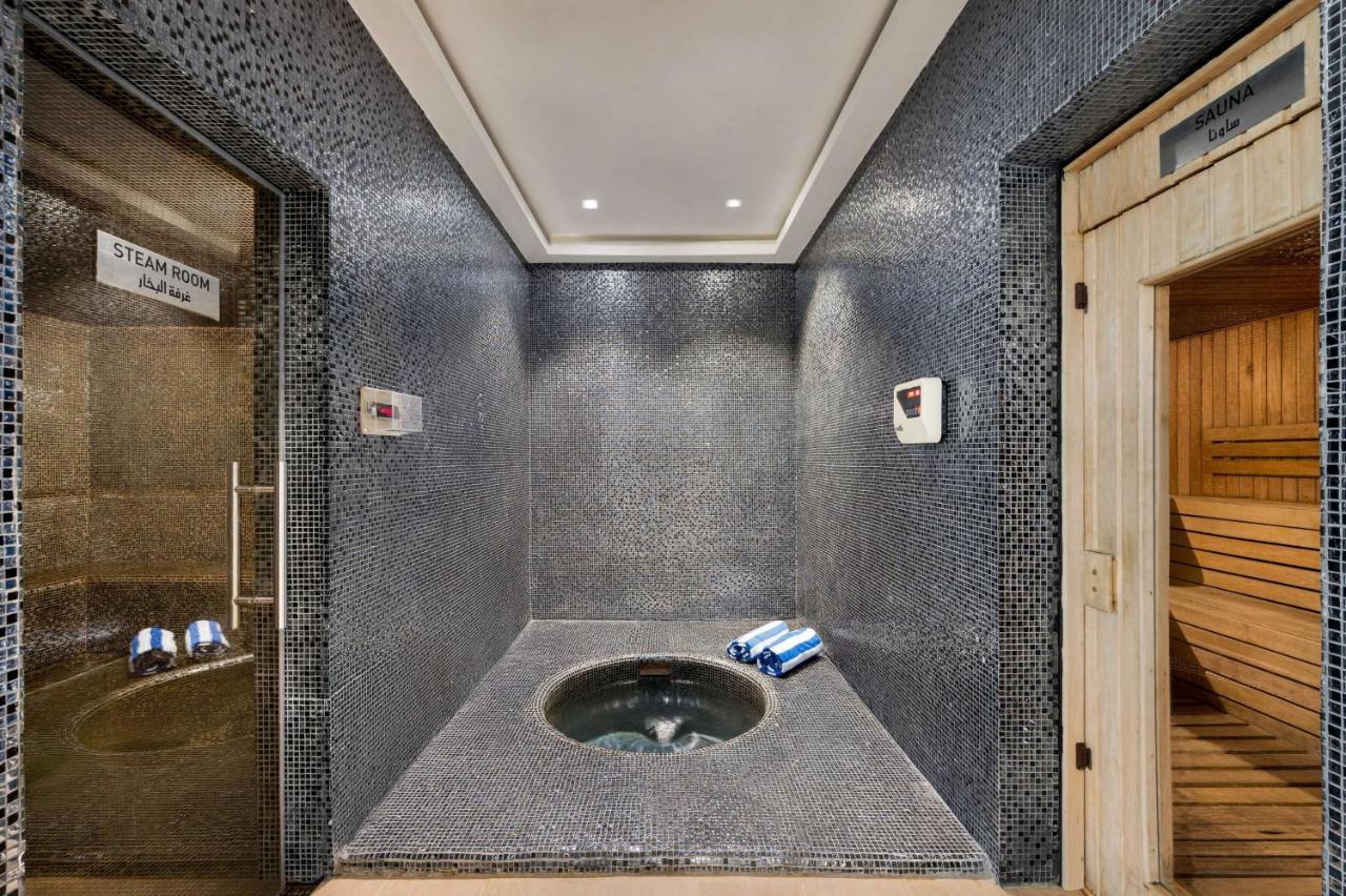 ホテル ウィンダム ドーハ ウェスト ベイ エクステリア 写真 A modern steam room